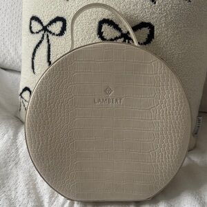 Beige Croc-Embossed Round Backpack